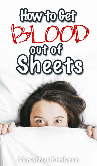 How to get dried blood out of Sheets.  A woman with the sheets pulled up over her nose.