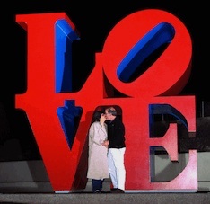 Steve & Annette Economides in front of the Love Statue.
