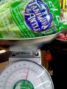 A head of leaf lettuce on a produce scale