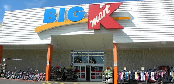 Kmart cashes personal checks - store front with a logo on it.