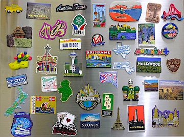 Refrigerator magnets from various travel destinations as souvenirs
