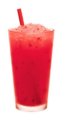 Sonic strawberry fruit slush in a glass with a red straw.