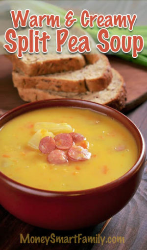 A brown crock bowl filled with split pea soup with chunks of ham on top. #SplitPeaSoup #SplitPeaSoupWithHam #CreamyPeaSoup