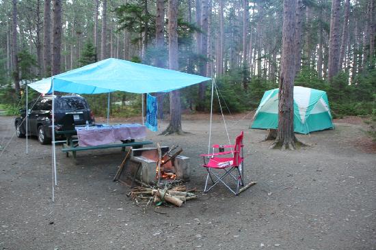 Tent camping to save money on a family vacation.