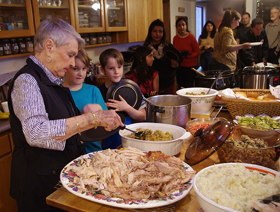 How to Cook a Turkey Like a Pro: Video & Tutorial 2 Thanksgiving food line turkey sliced